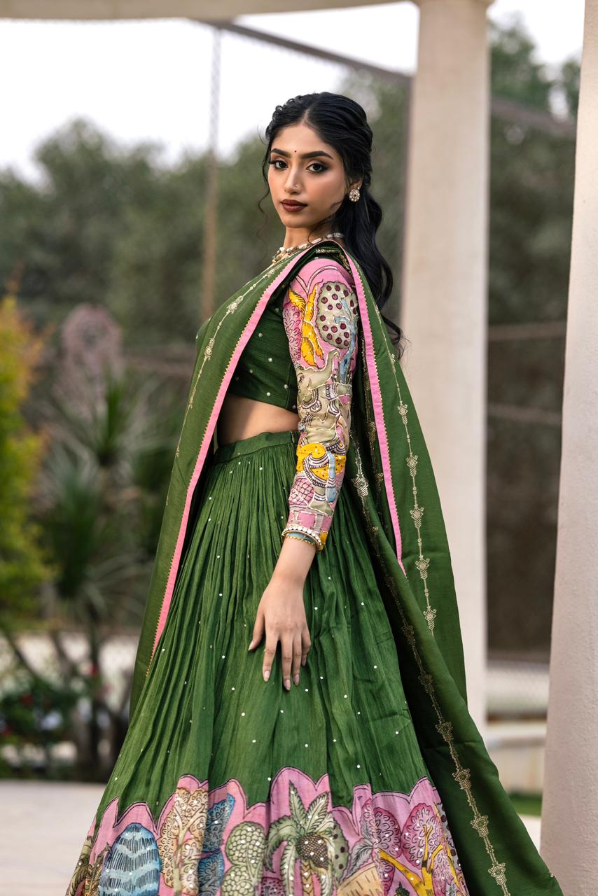 Green and pink ganesha lehenga set