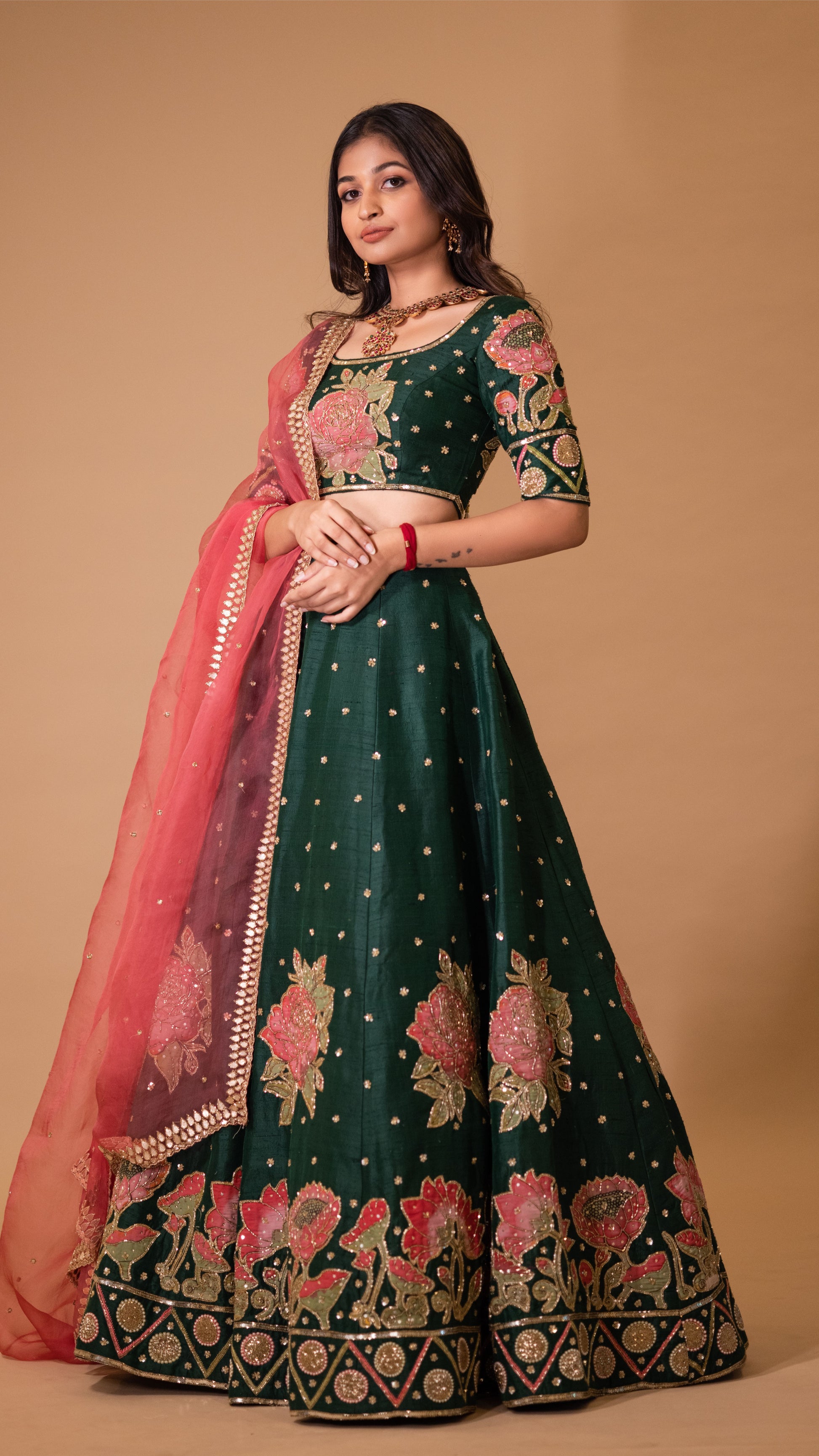 BOTTLE GREEN AND ROSE LEHENGA Aindhri by Mahitha BOTTLE GREEN AND ROSE LEHENGA Aindhri by Mahitha